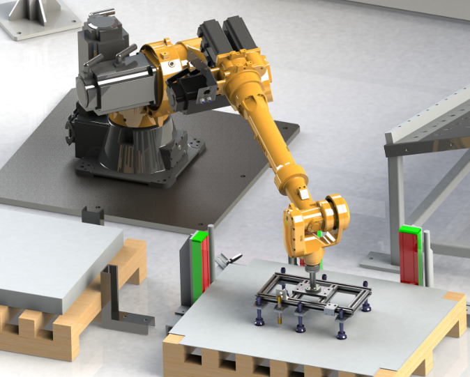 The robot grabs the material from the loading area
